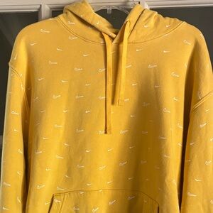 Yellow Nike hoodie with white Nike branding. Size XL. Excellent condition .